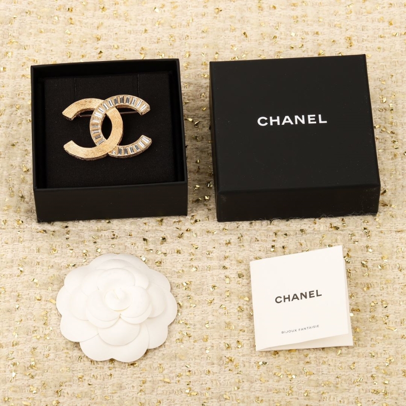 Ch*el brooches